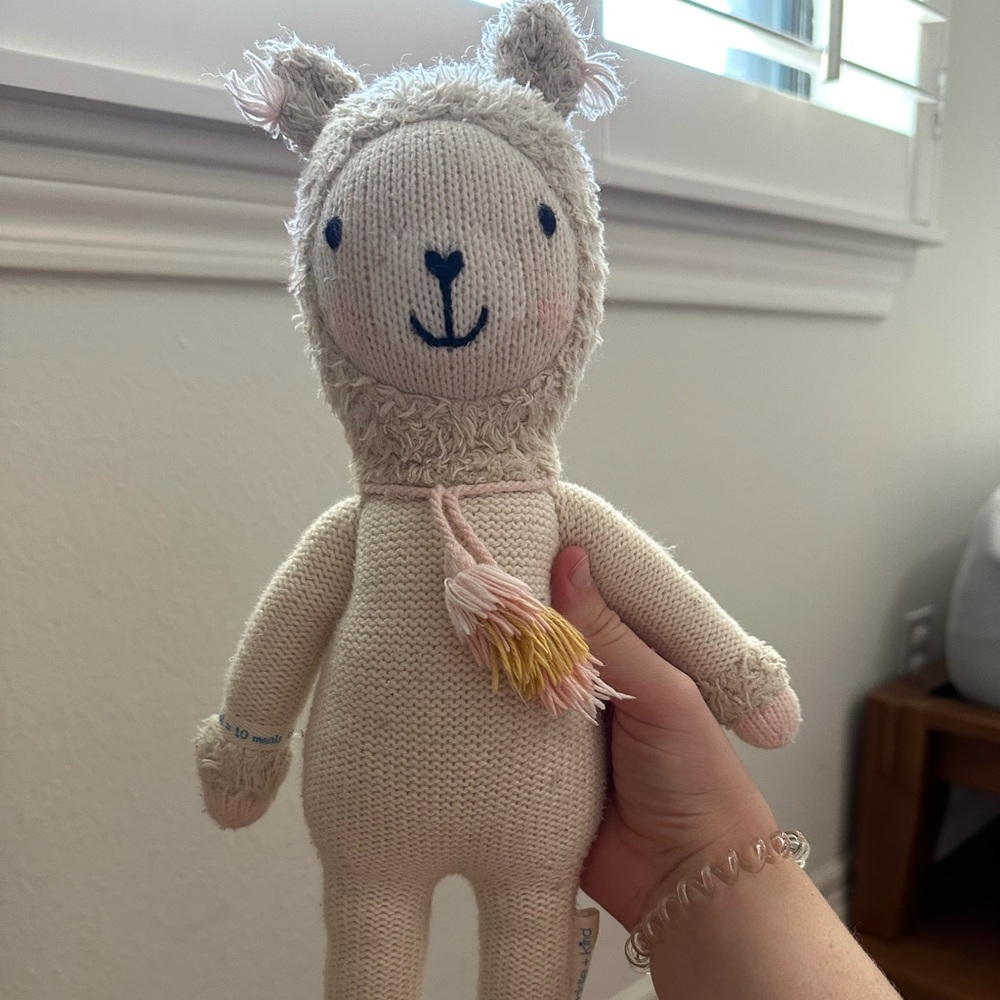 Cuddle and kind small Lola the llama doll